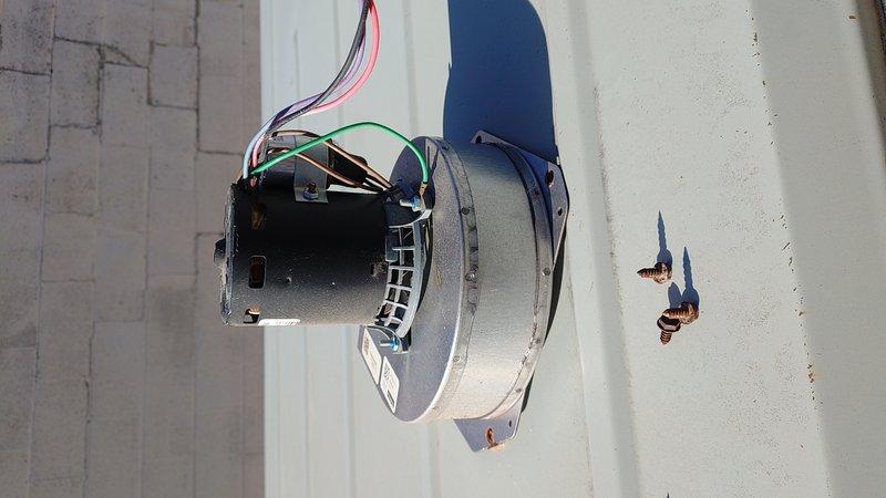 Responded to no-heat call at commercial building where temperature had dropped to 60°F. Upon inspection, found blower motor had failed, causing system to be unable to circulate heated air. Removed defective motor assembly and installed new replacement unit, reconnecting all wiring properly. After installation, tested system operation, verified proper heating function, and restored normal temperature to the building.