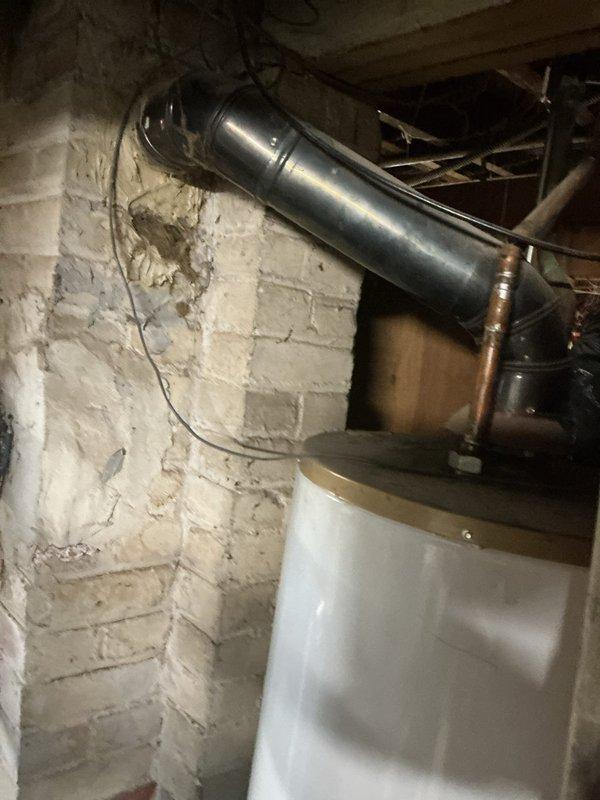 Responded to service call for non-igniting water heater pilot light in 10-year-old home. Inspected tank and ventilation system in basement utility area, identifying issues with the pilot assembly. Cleaned thermopile/thermocouple components, verified proper gas supply, and restored proper pilot flame. Tested water heater through complete heating cycle to confirm repair success and inspected ventilation ducting to ensure proper exhaust flow.