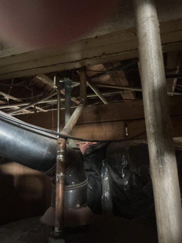 Responded to service call for non-igniting water heater pilot light in 10-year-old home. Inspected tank and ventilation system in basement utility area, identifying issues with the pilot assembly. Cleaned thermopile/thermocouple components, verified proper gas supply, and restored proper pilot flame. Tested water heater through complete heating cycle to confirm repair success and inspected ventilation ducting to ensure proper exhaust flow.