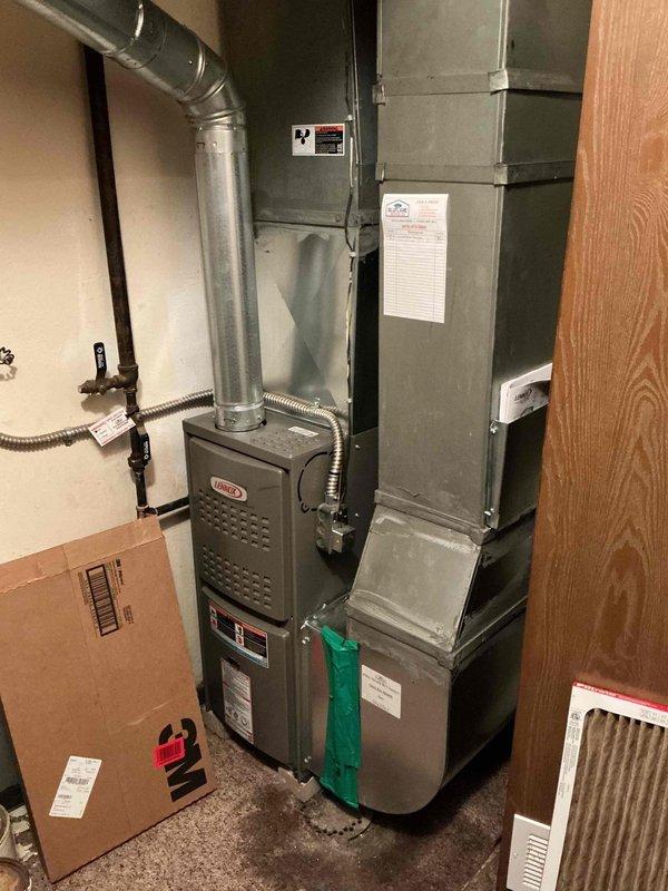 Performed standard furnace tune-up on Lennox unit. Conducted comprehensive combustion analysis using Testo 310 II gas analyzer, confirming proper operation with readings showing 80.0% efficiency, 373.6°F flue temperature, and acceptable CO/CO2 levels within normal range. System is operating safely and efficiently.