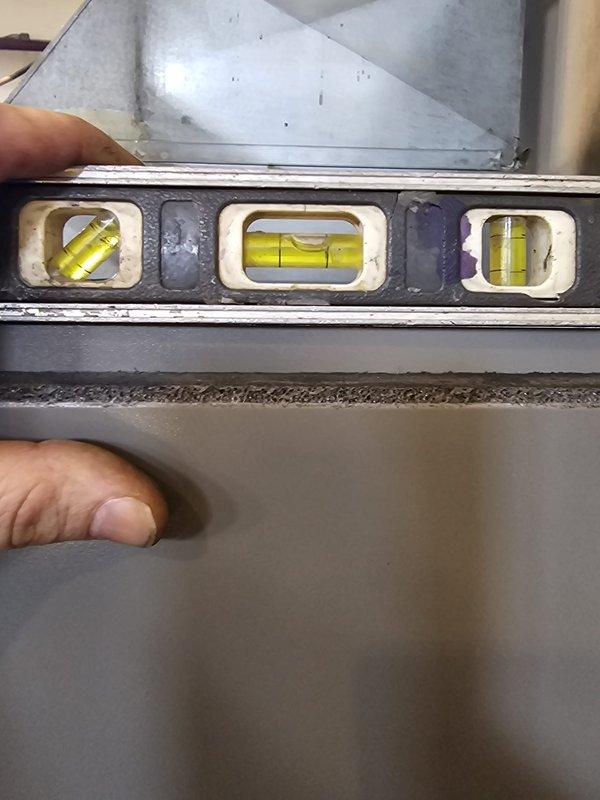 Completed installation of a Lennox 13 SEER 5-ton 135kBTU 96% efficiency gas split system with new 3-phase condensing unit for commercial application. Installation included new equipment pad, metal furnace base, flush line set conversion (R-11), new 3-phase disconnect and whip, and Honeywell WiFi thermostat, with all components properly leveled and installed to code specifications.