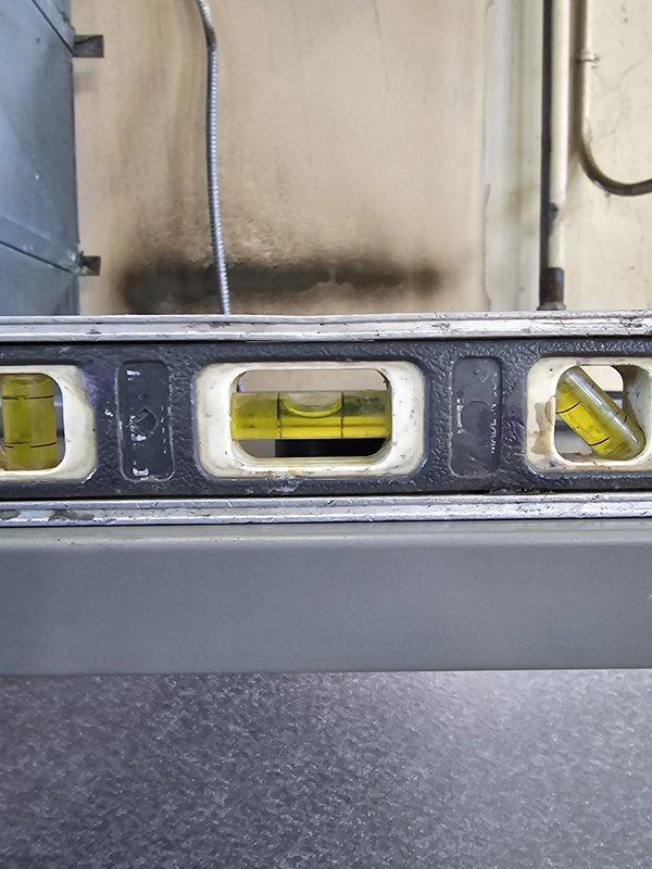 Completed installation of a Lennox 13 SEER 5-ton 135kBTU 96% efficiency gas split system with new 3-phase condensing unit for commercial application. Installation included new equipment pad, metal furnace base, flush line set conversion (R-11), new 3-phase disconnect and whip, and Honeywell WiFi thermostat, with all components properly leveled and installed to code specifications.