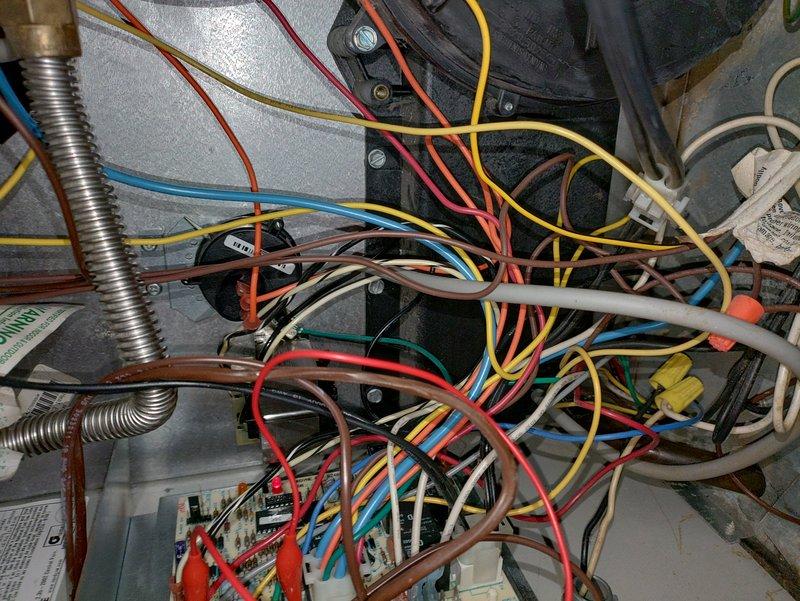 Responded to emergency no-heat call for a modern furnace system. Diagnostic inspection revealed faulty wiring connections at the control board, with several loose and improperly terminated wires affecting system operation. Repaired all electrical connections, securing wire terminations and ensuring proper circuit completion, which successfully restored heating function to the system.