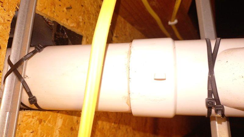 Responded to emergency call for CO emissions from gas furnace installed approximately one year ago. Inspection revealed improper PVC venting installation with inadequate securing methods and non-compliant joints. Corrected venting system by properly securing pipe connections and ensuring proper sealing to eliminate carbon monoxide leakage.