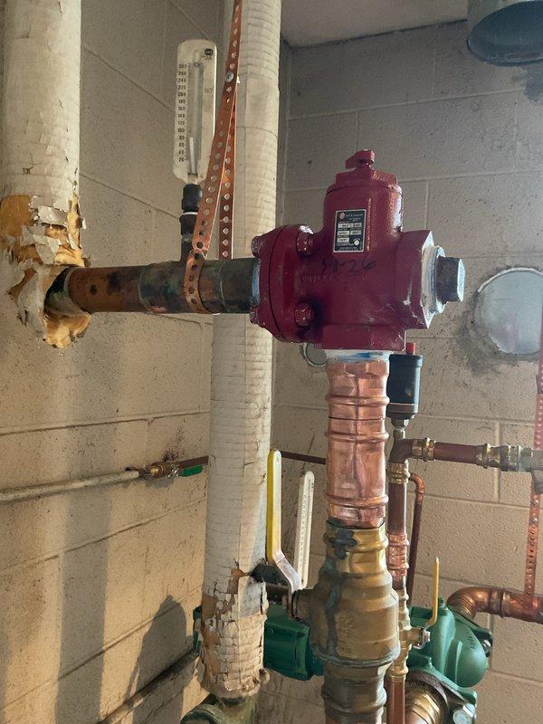 Successfully installed a new Taco circulator pump and flow valve on the heating system. Utilized pipe freezing technique to facilitate valve replacement without draining the system. All components properly connected to copper piping network and tested for proper operation.