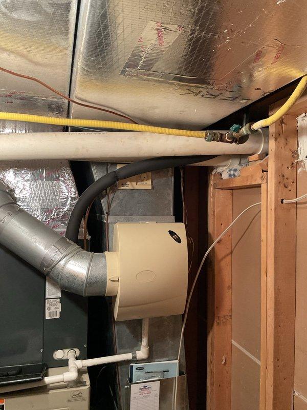 Conducted a comprehensive assessment of the existing exterior HVAC unit (currently weather-protected with a tarp cover) and interior ductwork system including humidifier. Provided detailed replacement estimate for a complete system upgrade, recommending appropriate equipment sizing based on home's square footage and insulation values, with options for improved energy efficiency and enhanced indoor air quality components.
