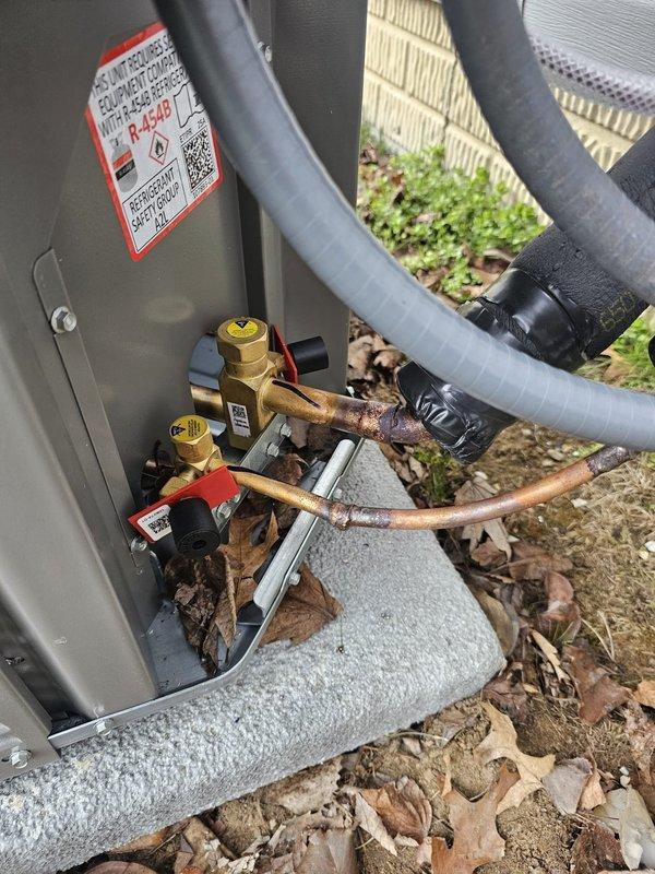 Completed installation of a 2-ton, 17 SEER 2-stage AC package with retrofit coil on EL296V furnace. Work included installing new 3/4" x 25' lineset, concrete equipment pad, electrical disconnect and whip, Honeywell WiFi thermostat, and 17-gallon humidifier. All connections were properly secured and system was tested for proper operation.