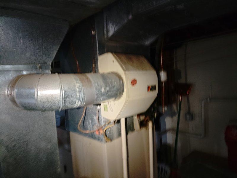 Responded to no-heat service call where furnace was maintaining only 56°F. Upon inspection of the furnace unit, discovered disconnected wiring in the control compartment where multiple colored wires (red, yellow, blue) had become detached. Reconnected and secured all loose connections, verified proper operation of ignition sequence, and confirmed heat production with multiple test cycles. System now functioning properly and maintaining desired temperature.