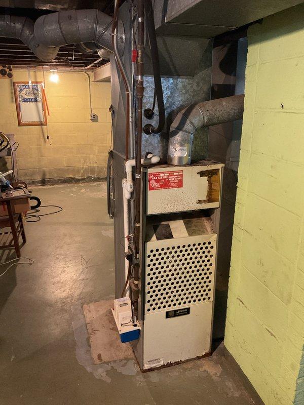 Conducted comprehensive estimate for full HVAC system replacement including humidifier installation. Current system shows significant age with visible rust, deterioration, and outdated components. Recommended complete replacement of existing furnace unit and associated ductwork to improve efficiency and reliability.