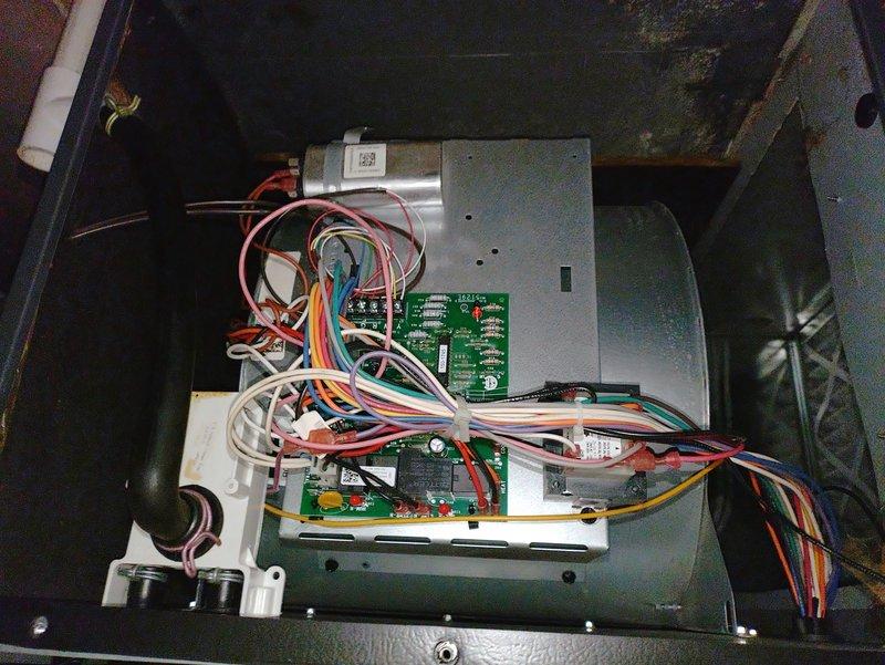 Diagnosed a furnace with no heat issue in a 10-year-old system located in a crawlspace. Inspection revealed faulty control board connections with multiple wire harness issues causing system failure. Repaired damaged wiring connections and restored proper function to the control circuit, returning heat operation to normal.