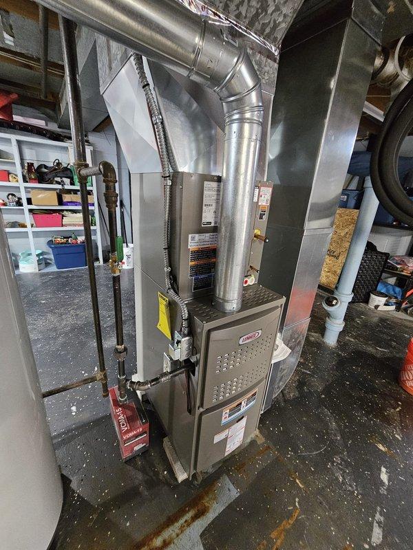 Successfully installed a complete HVAC system including an 80% efficient 70 kBTU upflow furnace with upflow coil, single-stage condensing unit, and a 50-gallon water heater. Relocated outdoor unit to end of house with new equipment pad, installed new lineset (3/4" x 30'), new disconnect and whip, and added a J-box to splice into existing circuit, while reusing the 30-amp breaker from the panel and installing a Honeywell T6 Pro thermostat.