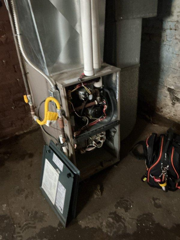 Performed post-flood assessment of furnace and hot water tank to determine viability for insurance claim purposes. Upon inspection, the water heater appeared properly installed with all connections intact, while the furnace was examined with access panel removed to check internal components including wiring, control board, and mechanical parts. Both systems were evaluated for water damage and operational integrity.