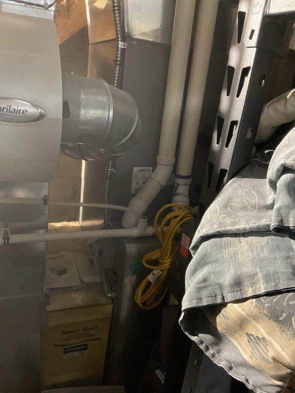 # HVAC Install Call Back - Service Summary

Responded to warranty callback for installation correction inspection. Upon arrival, conducted comprehensive evaluation of recently installed water heater system and associated mechanical components per manufacturer specifications.

## Work Performed

Inspected Bradford White water heater installation and identified multiple deficiencies requiring correction. Addressed flue pipe installation concerns where improper sealing was causing potential exhaust leakage. Corrected flue connection to ensure proper venting and eliminate leak points in accordance with manufacturer requirements and code compliance.

Completed condensate drain line installation which was previously incomplete. Routed and secured condensate piping properly to ensure adequate drainage and prevent water damage. Verified proper pitch and termination point for condensate discharge.

Evaluated unit positioning and access clearances. Noted that current water heater orientation res
