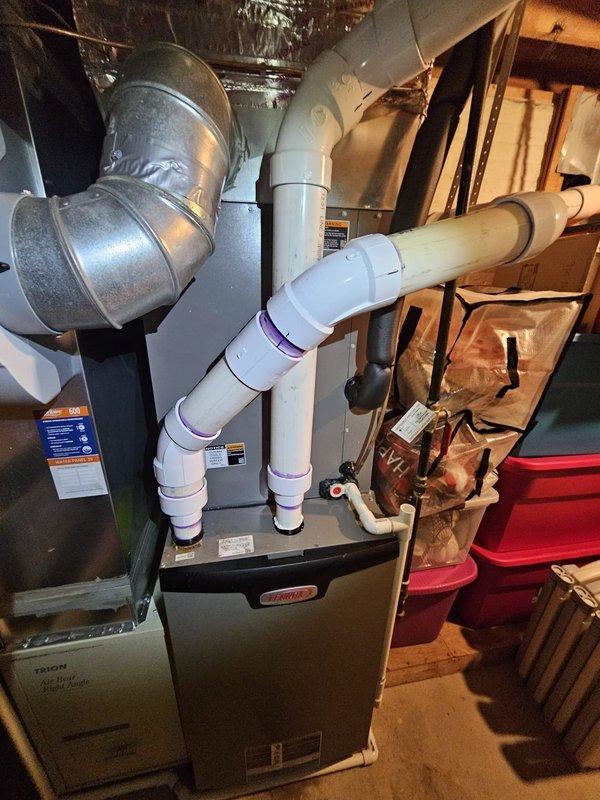 Responded to warranty callback for 3" PVC condensate drain leak at fitting connection on 2024 Lennox furnace installation. Replaced defective fitting and damaged pipe section, confirmed proper drainage and sealed all connections. Issue traced to original installation; repair completed under warranty at no charge to customer.