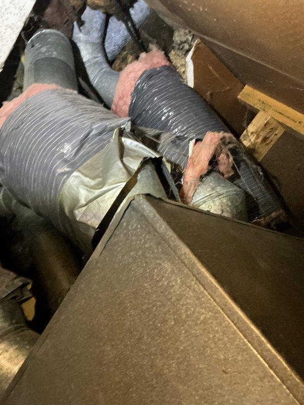 Responded to emergency service call for reported rubber burning smell from furnace. Upon arrival, conducted thorough inspection of furnace and ductwork system in attic space. Examined electrical connections at junction box and identified potential overheating issue at wire terminations. Inspected flexible ductwork, plenum connections, and insulation for signs of thermal damage or compromised seals that could indicate source of odor.