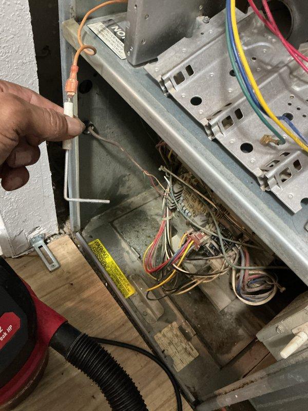 Completed annual maintenance on gas furnace over 10 years old, including inspection of electrical connections, burner assembly, and ductwork. Verified proper operation of all system components, cleaned accessible areas, and documented condition of aging equipment with visible wear on ductwork and interior components.