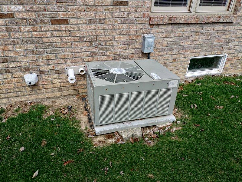 Completed routine maintenance on a 7-year-old residential air conditioning system. Inspected outdoor condensing unit, electrical disconnect box, and associated components. Contactor showed signs of aging with visible corrosion on metal surfaces; capacitor and electrical connections inspected and found operational. All wiring connections verified secure, and unit tested for proper operation.