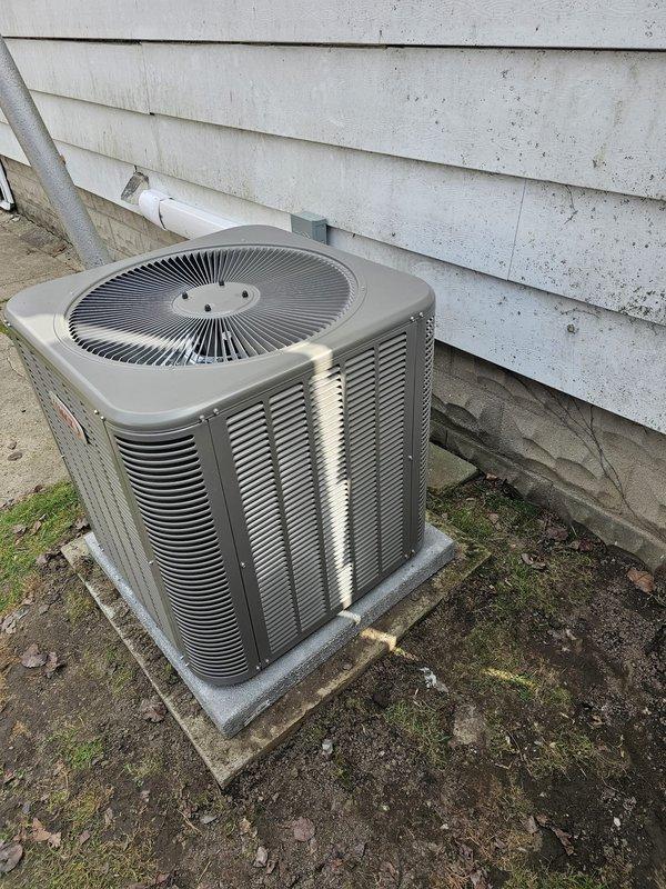 Completed full system replacement installing a Lennox 15.5 SEER, 2.5 ton split gas system with AHRI certificate 215581237. Installed 70,000 BTU 80% AFUE upflow gas furnace with matching upflow cased evaporator coil. Added 120v condensate pump with new condensate tubing, metal filter rack sized 16x25x5, and 12-gallon whole-home humidifier. Ran new 3/4" x 30' refrigerant line set connecting indoor and outdoor units. Leveled existing concrete pad and positioned new condenser unit on site. Installed 30-amp electrical disconnect with #10 gauge whip for proper power supply. Mounted Honeywell T6 Pro programmable thermostat for system control. All equipment installed per local code requirements and manufacturer specifications. Verified proper system operation including airflow, refrigerant charge, gas pressures, electrical connections, drainage, and humidification functions. System tested in both heating and cooling modes with all parameters within manufacturer specifications.
