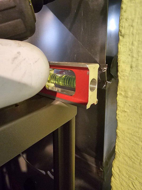 Completed full system replacement installing a Lennox 15.5 SEER, 2.5 ton split gas system with AHRI certificate 215581237. Installed 70,000 BTU 80% AFUE upflow gas furnace with matching upflow cased evaporator coil. Added 120v condensate pump with new condensate tubing, metal filter rack sized 16x25x5, and 12-gallon whole-home humidifier. Ran new 3/4" x 30' refrigerant line set connecting indoor and outdoor units. Leveled existing concrete pad and positioned new condenser unit on site. Installed 30-amp electrical disconnect with #10 gauge whip for proper power supply. Mounted Honeywell T6 Pro programmable thermostat for system control. All equipment installed per local code requirements and manufacturer specifications. Verified proper system operation including airflow, refrigerant charge, gas pressures, electrical connections, drainage, and humidification functions. System tested in both heating and cooling modes with all parameters within manufacturer specifications.