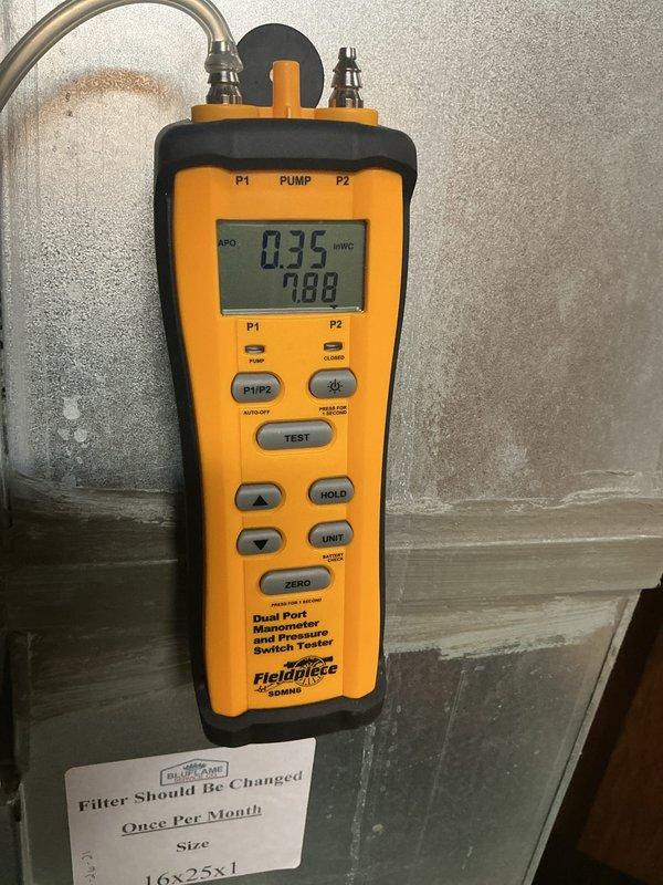 Performed preventive maintenance on 5-year-old gas furnace system. Measured and verified gas pressure readings at 0.75 and 7.88 inches water column using dual port manometer to ensure proper combustion and system operation. Inspected Aprilaire humidifier installation and associated PVC drainage components for proper function and integration with HVAC system.