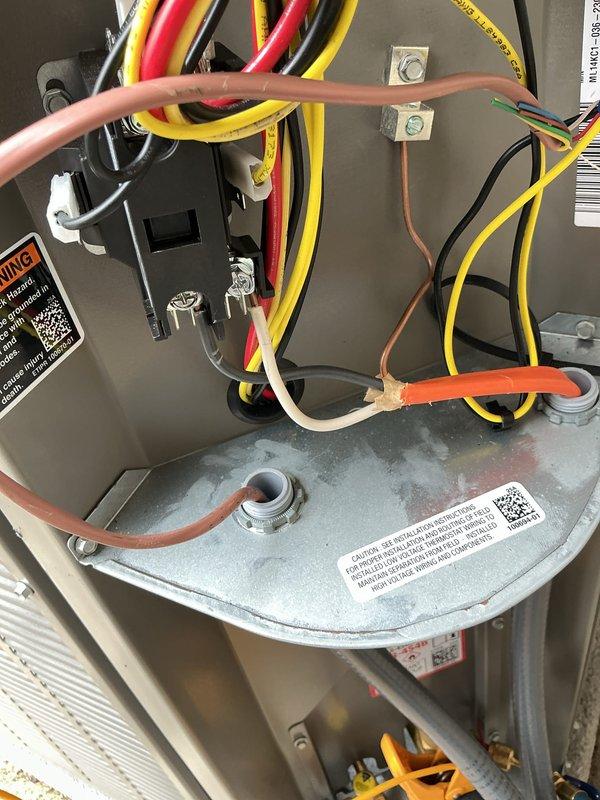 Completed warranty AC system start-up and inspection. Verified all electrical connections at terminal blocks, confirmed proper wire routing and securing with zip ties in the air handler compartment. Checked blower motor assembly operation, tested system performance using digital diagnostic meter, and inspected refrigerant lines for proper installation. All components functioning within manufacturer specifications, system operational and ready for service.