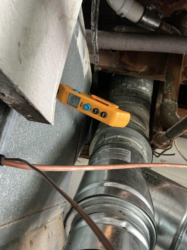 Completed warranty AC system start-up and inspection. Verified all electrical connections at terminal blocks, confirmed proper wire routing and securing with zip ties in the air handler compartment. Checked blower motor assembly operation, tested system performance using digital diagnostic meter, and inspected refrigerant lines for proper installation. All components functioning within manufacturer specifications, system operational and ready for service.