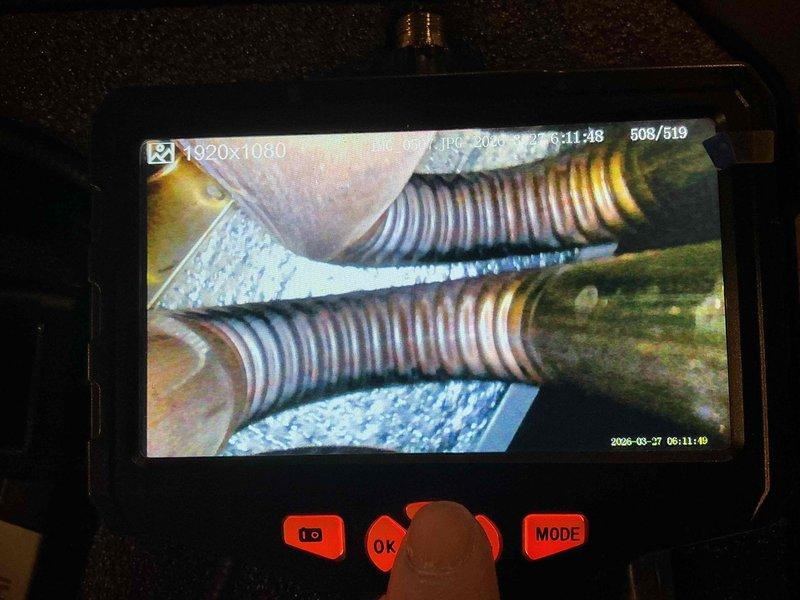 Performed scheduled furnace maintenance on an 11-year-old heating system under prepaid maintenance plan. Conducted thorough inspection of heat exchanger using borescope camera to examine internal surfaces for cracks, corrosion, or deterioration. All components inspected and found to be in satisfactory operating condition.