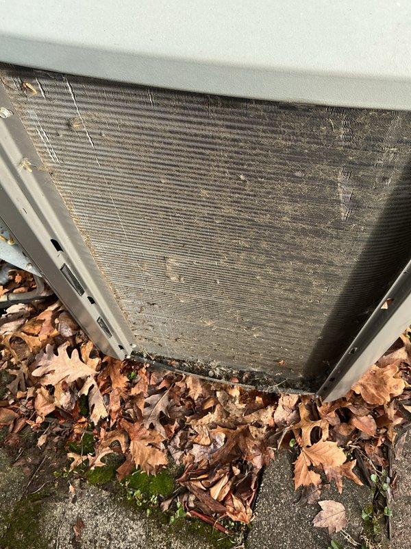 Completed preventive maintenance on 14-year-old air conditioning system during scheduled service window. Inspected outdoor condenser unit, noting accumulated debris and leaf buildup around base; cleaned exterior surfaces and removed obstructions to ensure proper airflow. Evaluated and serviced indoor air handler, including filter inspection which showed moderate dust accumulation on pleated media but remained serviceable. All system components operating within normal parameters upon completion.