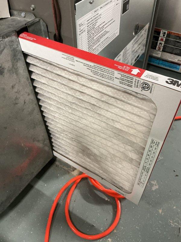 Completed preventive maintenance on 14-year-old air conditioning system during scheduled service window. Inspected outdoor condenser unit, noting accumulated debris and leaf buildup around base; cleaned exterior surfaces and removed obstructions to ensure proper airflow. Evaluated and serviced indoor air handler, including filter inspection which showed moderate dust accumulation on pleated media but remained serviceable. All system components operating within normal parameters upon completion.