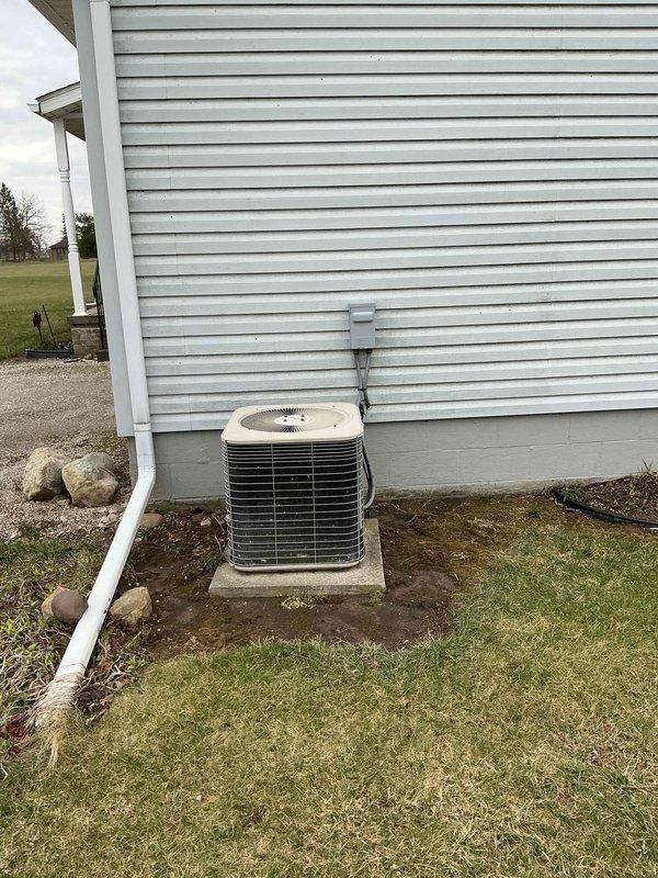 Responded to service call for Lennox furnace running excessively with inadequate heating and noise issues that began following recent AC service two days prior. Upon arrival, performed complete system diagnostic including visual inspection of indoor air handler unit, ductwork connections, and outdoor condensing unit. Verified PVC condensate drain lines and venting system were properly installed and functioning. Checked all electrical connections, conduit routing, and safety controls. Inspected blower motor operation, heat exchanger, and air flow through system. Documented equipment condition with photographs showing proper installation of vertical PVC piping from furnace, secure duct connections to metal plenum, and outdoor unit positioning on concrete pad. System producing some heat but not achieving adequate temperature rise across heat exchanger. No error codes present at time of inspection.