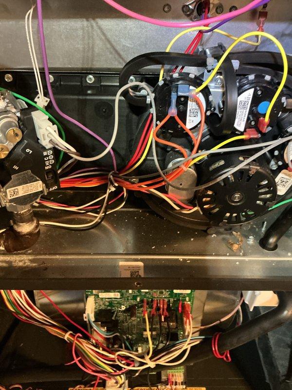 Completed MVP recurring heating and cooling maintenance visit on HVAC system. Performed comprehensive inspection of furnace components including gas valve assembly, blower motors, control board, and all electrical connections. All components found operating within normal parameters with proper wire terminations and secure mounting hardware.