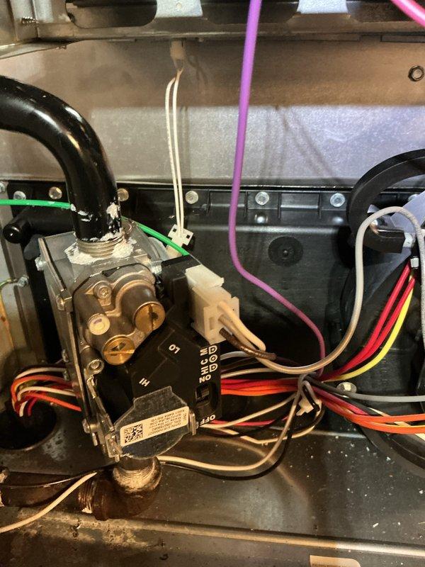 Completed MVP recurring heating and cooling maintenance visit on HVAC system. Performed comprehensive inspection of furnace components including gas valve assembly, blower motors, control board, and all electrical connections. All components found operating within normal parameters with proper wire terminations and secure mounting hardware.