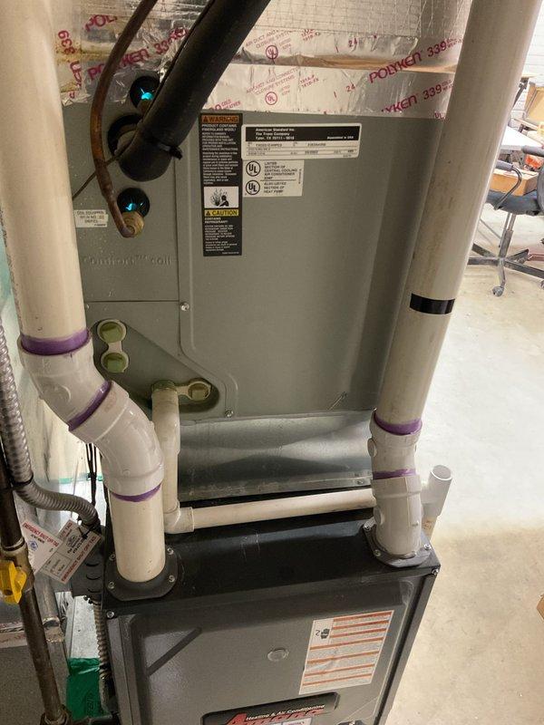 Conducted on-site assessment for air conditioning replacement estimate at residential property with existing furnace previously installed by our company. Inspected current outdoor condensing unit mounted on concrete blocks with proper electrical disconnect and conduit installation, along with indoor air handler connected to water heater via PVC venting system. Documented equipment specifications, installation configurations, and system compatibility to prepare comprehensive replacement proposal for new AC system that will integrate with existing furnace infrastructure.