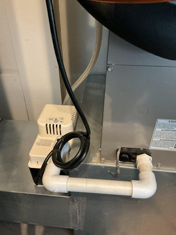 Completed scheduled maintenance on a 5+ year old air conditioning system. Inspected condensate pump assembly, drainage piping, and verified proper trap configuration. Accessed control board within air handler cabinet, checked electrical connections and wiring integrity across all low-voltage circuits.