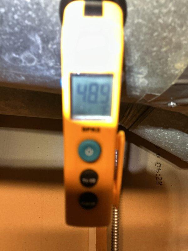 Completed AC system start-up and commissioning. Verified system voltage at 245V at outdoor unit and confirmed proper electrical connections. Measured supply air temperature at 48.5°F at indoor unit, indicating adequate refrigerant charge and proper system operation. All electrical connections tested and secured, system operating within manufacturer specifications.