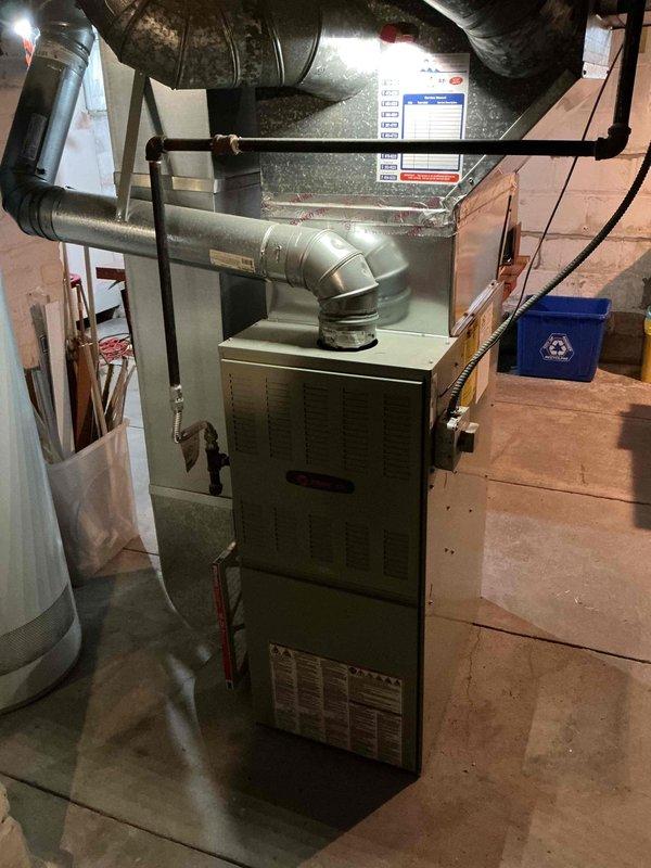 Completed scheduled heating system tune-up and maintenance on residential gas furnace. Performed comprehensive inspection of all major components including heat exchanger, burner assembly, induced draft blower motor, gas valve, control board, and electrical connections. All systems tested and verified operational with no deficiencies noted. Unit left in proper working condition.