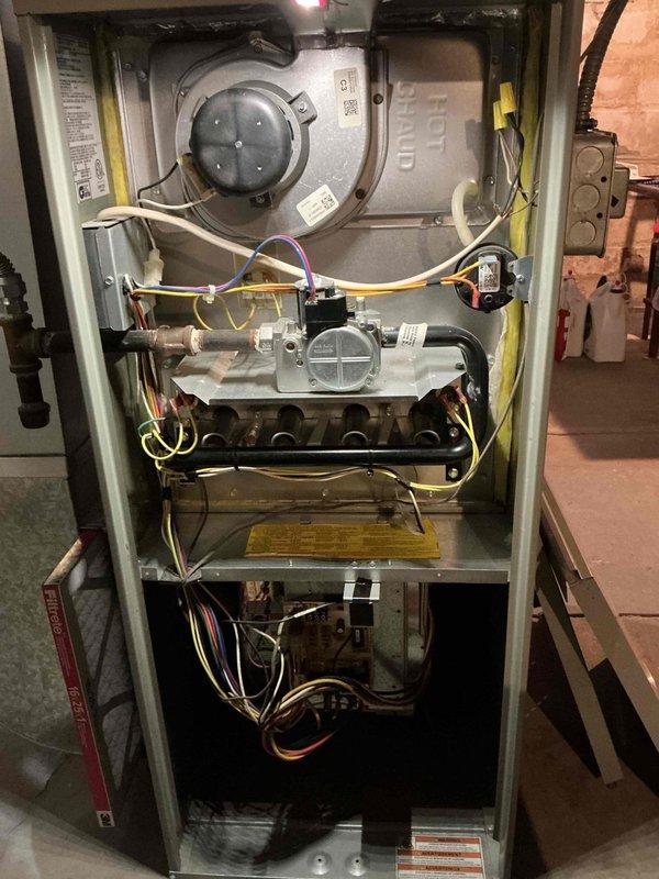 Completed scheduled heating system tune-up and maintenance on residential gas furnace. Performed comprehensive inspection of all major components including heat exchanger, burner assembly, induced draft blower motor, gas valve, control board, and electrical connections. All systems tested and verified operational with no deficiencies noted. Unit left in proper working condition.