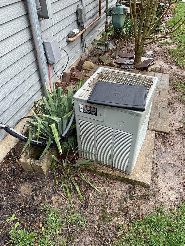 Conducted comprehensive assessment of existing residential HVAC system for complete replacement, including outdoor condensing unit on concrete pad and indoor air handler/furnace assembly located in garage. Evaluated current equipment condition, ductwork configuration, refrigerant line routing, electrical service connections, and installation accessibility. Documented existing system specifications and photographed both exterior and interior components to provide accurate replacement recommendations and ensure proper equipment sizing for the home's heating and cooling requirements.