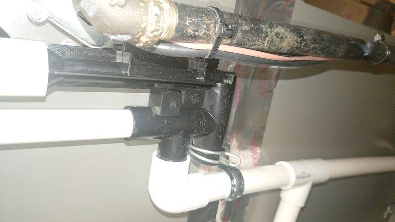 Responded to service call for HVAC system evaluation. Upon inspection, discovered significant condensate drainage issues affecting the furnace system, including deteriorated chrome P-trap components and water staining on surrounding surfaces near the condensate drain pan. Assessed drainage assembly connections and PVC piping configuration to ensure proper condensate flow and prevent future water damage to the installation area.