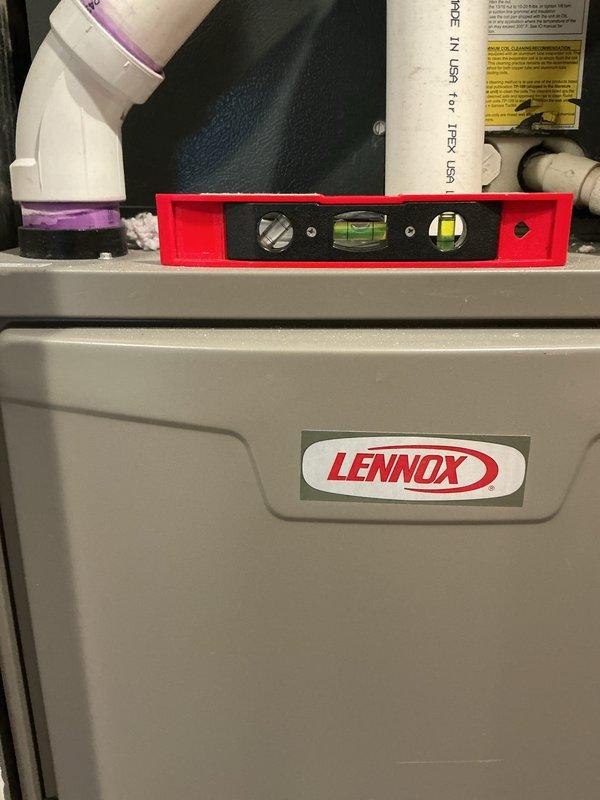 # Annual Furnace Maintenance Completed

Performed comprehensive preventive maintenance on 1-year-old Lennox furnace system. Verified proper equipment leveling and installation integrity using precision level tool. Conducted electrical diagnostics and measurements using Fluke 116 True RMS multimeter, recording system parameters to ensure proper operation. Inspected condensate drainage system including PVC piping connections and verified all joints were secure. Checked aluminum coil condition and confirmed proper system operation. All components found to be functioning within manufacturer specifications with no immediate service needs identified.