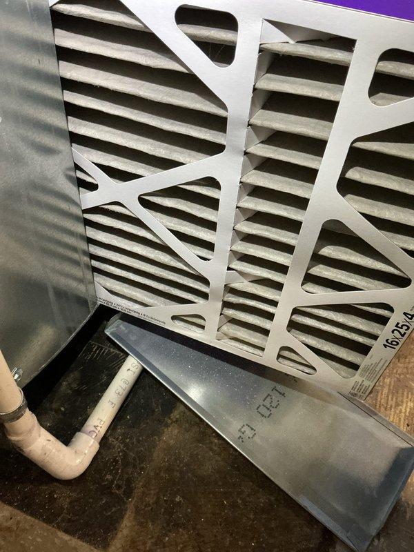 Completed comprehensive heating system tune-up and maintenance service. Inspected HVAC system components, including air handler unit and filtration system. Identified significant dust accumulation on return air grille mesh screen, indicating reduced airflow efficiency. Removed and replaced dirty pleated air filters with new units to restore proper system airflow and improve indoor air quality. Verified all mechanical components operating within normal parameters upon completion of maintenance procedures.