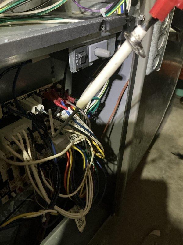 Completed MVP recurring heating maintenance visit on HVAC system. Performed comprehensive inspection of heating unit interior components, electrical connections, and wiring systems. All electrical connections, wire bundles, and internal components were examined and found to be in proper operating condition with adequate wire management and secure mounting throughout the cabinet compartment.