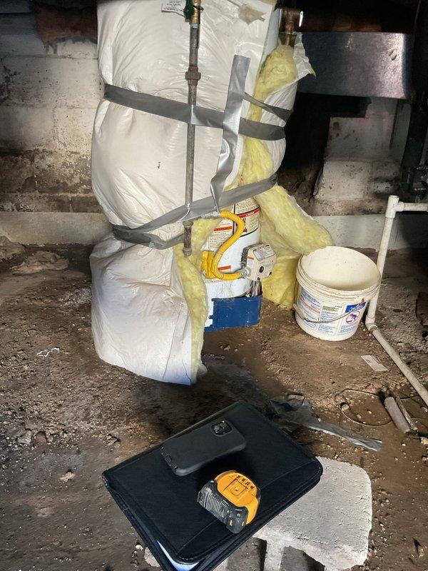 Conducted comprehensive water heater replacement estimate in basement utility area. Documented existing conditions including aged infrastructure, deteriorated masonry walls with water staining, exposed ductwork, and current mechanical system layout. Assessed installation requirements, clearance specifications, venting pathways, and necessary modifications to accommodate new water heater unit while ensuring compliance with current plumbing codes and manufacturer specifications.
