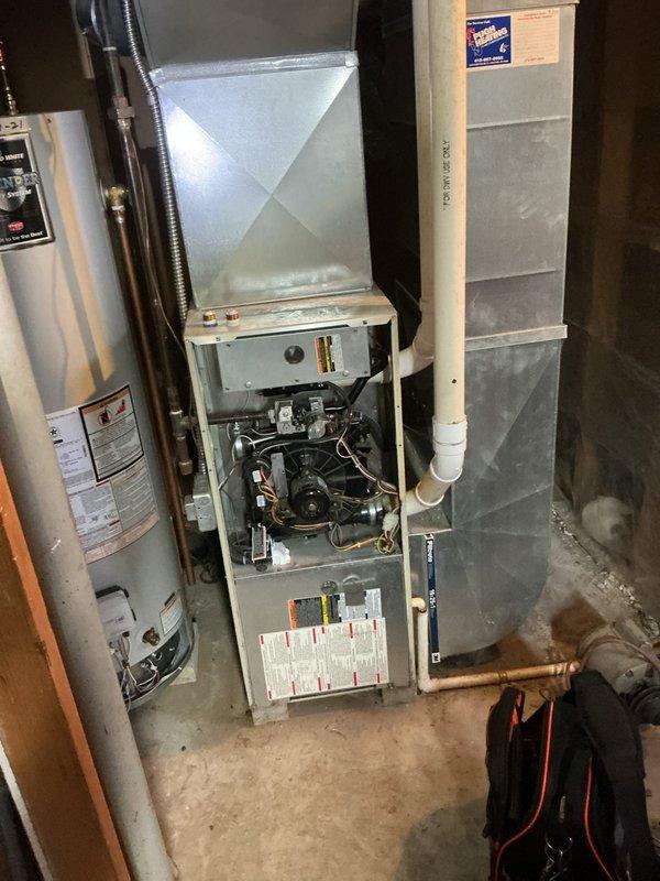 Responded to no-heat emergency call for 25-year-old gas furnace that experienced loud bang prior to failure. Upon arrival, accessed furnace cabinet and conducted comprehensive system inspection including burner assembly, gas valve, ignition components, and control board. Diagnosed failed heat exchanger with visible crack causing unsafe operating condition. Explained immediate safety concerns and recommended unit replacement due to age and extent of damage. Shut down furnace and disabled gas supply to ensure occupant safety until replacement could be scheduled.