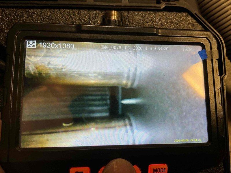 Responded to heating service call that was previously dismissed as a Return Service Event. Performed diagnostic inspection of system using digital borescope camera to examine internal ductwork and heat exchanger components. Visual inspection revealed discoloration and potential debris accumulation within the system requiring documentation and further evaluation.