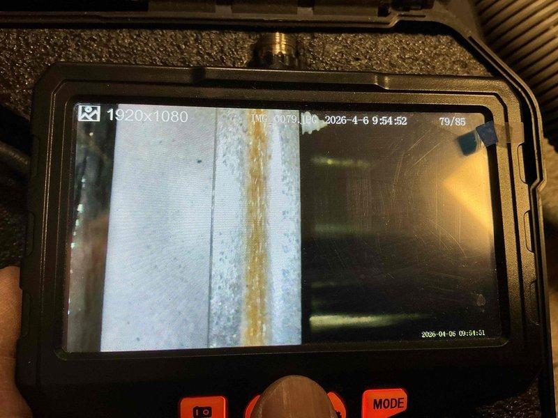 Responded to heating service call that was previously dismissed as a Return Service Event. Performed diagnostic inspection of system using digital borescope camera to examine internal ductwork and heat exchanger components. Visual inspection revealed discoloration and potential debris accumulation within the system requiring documentation and further evaluation.