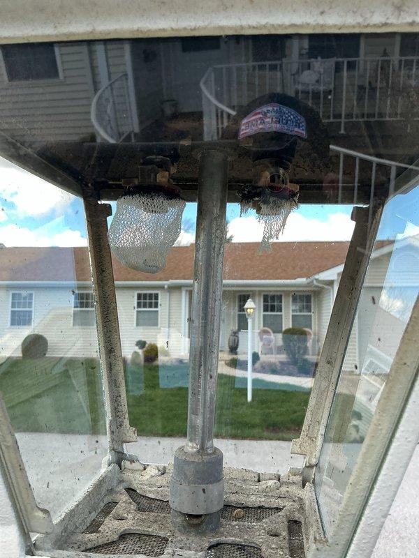 Responded to service call for exterior natural gas line issue. Upon inspection, identified compromised gas line penetration through exterior architectural column with evidence of deterioration and potential pest intrusion affecting gas supply integrity. Assessed exterior gas line routing and connection points from below-grade access area. Documented existing conditions and structural concerns requiring attention to ensure safe gas delivery to heating equipment.