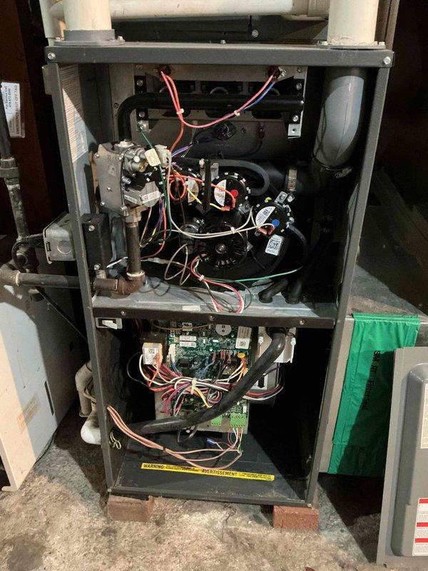 Performed comprehensive furnace tune-up and combustion analysis on natural gas heating system. Conducted flue gas testing using calibrated analyzer, confirming optimal combustion efficiency at 93.9% with carbon monoxide levels at 6 ppm, oxygen content at 6.7%, and stack temperature at 102°F—all readings within manufacturer specifications and safety standards.