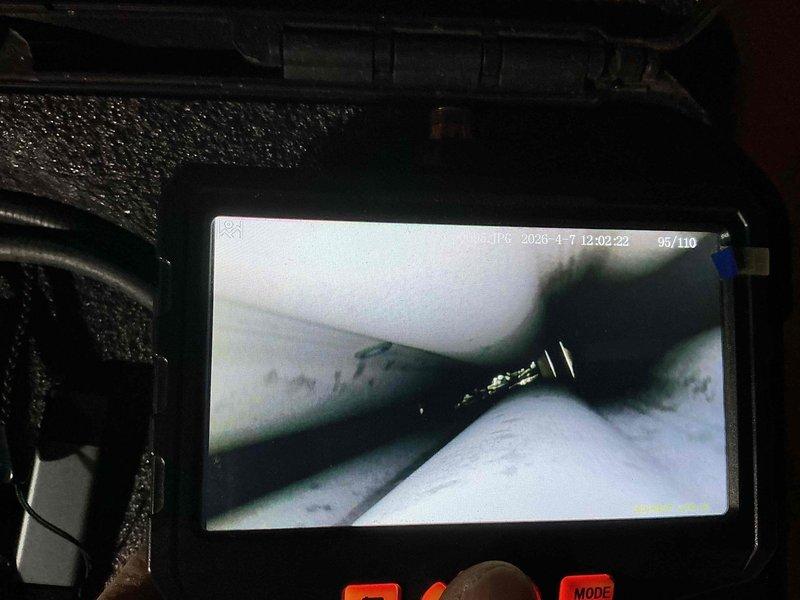 Responded to callback for furnace not producing warm air. Performed video inspection of ductwork and interior components using borescope camera to identify airflow restrictions or disconnected ducts. Documented findings with timestamped inspection footage showing interior duct conditions and potential obstruction points.