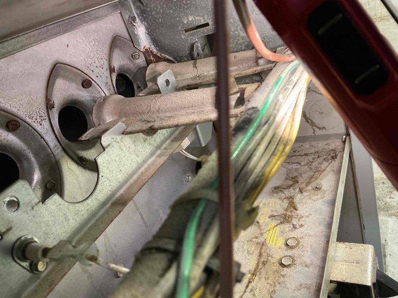 Responded to furnace repair call for 12-year-old unit in single-family residence. Upon arrival, performed diagnostic inspection of heating system and identified failed burner assembly component requiring replacement. Removed deteriorated burner orifice manifold showing signs of age-related wear and corrosion. Installed new burner orifice assembly and verified proper gas flow distribution. Cleaned accumulated dust and debris from internal components, including heat exchanger area and blower compartment. Inspected copper refrigerant lines and insulation for integrity. Tested system operation, confirmed proper ignition sequence, and verified adequate heat output. System restored to full operational status.